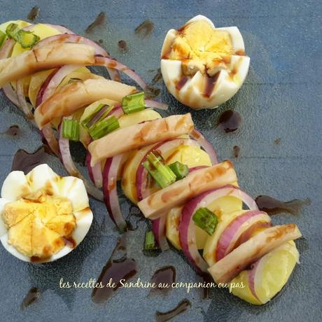 Salade de pommes de terre harengs fumés céleri branche œuf oignon rouge